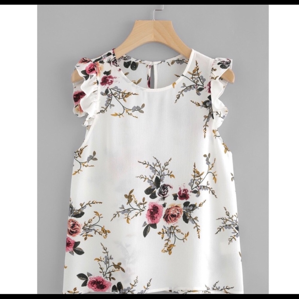 White floral short sleeve ruffled shell blouse